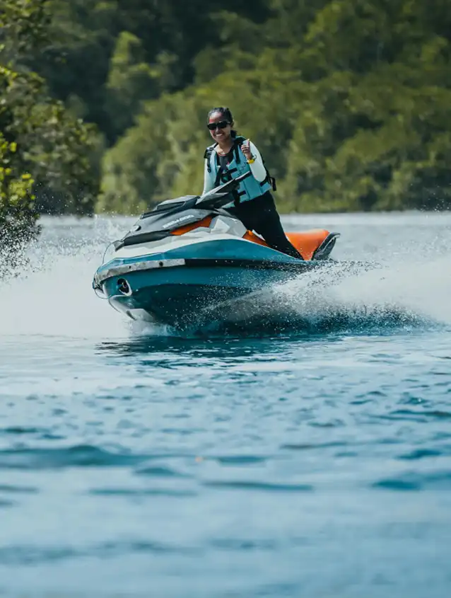 Woman Riding Water Jet Ski Image